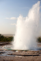 Fototapeta na wymiar Geysir destrict in the south of Iceland.The Strokkur Geyser erupting at the Haukadalur geothermal area, part of the golden circle, Iceland, Europe