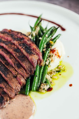 Wagyu Beef Flat Iron Steak with Truffle Vinaigrette and Vegetables 