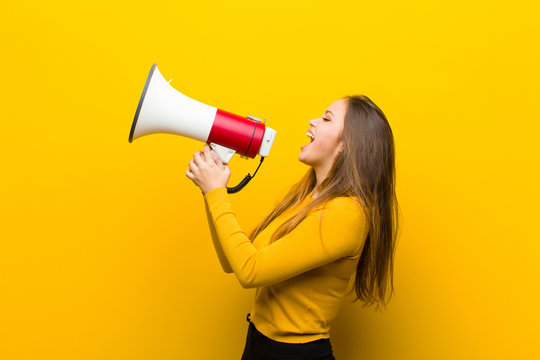 Young Pretty Woman With A Megaphone