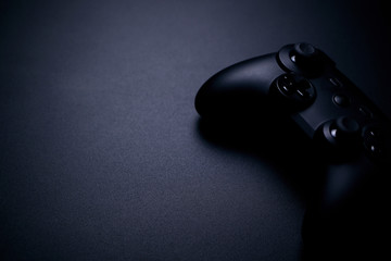 video game controller isolated on black background © Дмитрий Усык