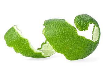 Lime fruit peel isolated on a white background. Fresh lime skin.