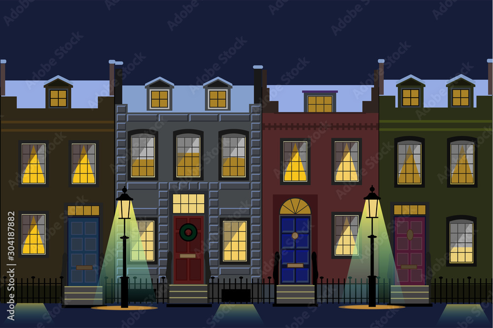 Wall mural house facades in lamp light a winter night.