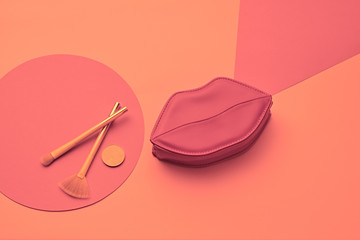 Fashion Lady Flat lay. Woman Essentials Set. Beauty accessories, Trendy Clutch, Brushes, lipstick. Coloful fashionable coral Minimal. art Creative gel filter pop art concept