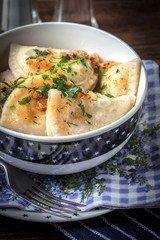 Dumplings with meat, onion and bacon.