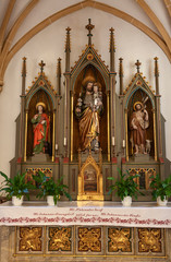 Obraz premium St. Joseph with the baby Jesus. Altar. Graz