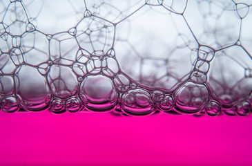 Two color soap bubble foam structure, molecule biological cell pattern. Neon fluid with dense foam...