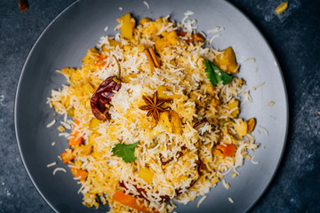 Biryani rice (Vegetable biryani). Indian basmati rice, curry vegetables and spices. Indian kitchen