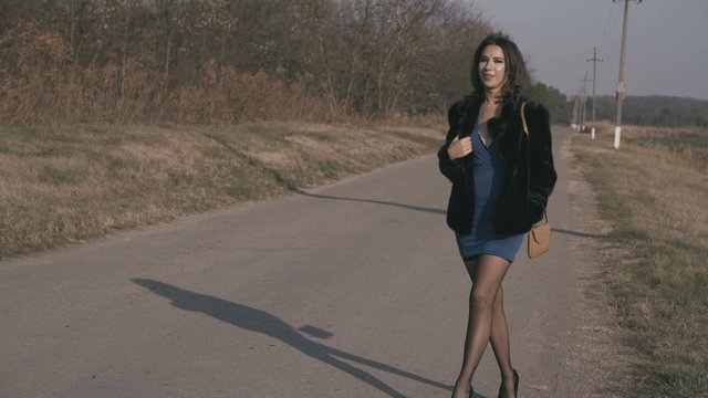Female Prostitute Standing On The Road