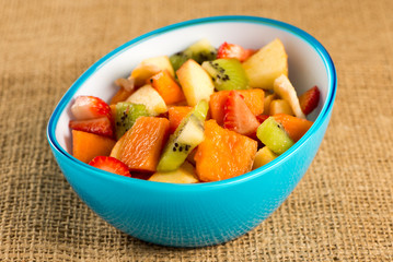 fruit salad in colorful bowls