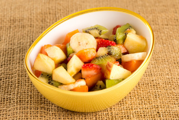 fruit salad in colorful bowls