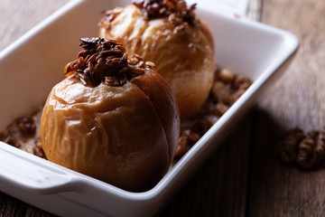 Vegan dessert, baked apples on rustic table