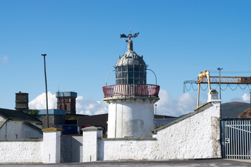 Fototapeta na wymiar lighthouse in the port