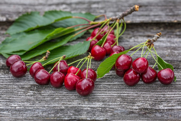 Fresh cherries on wooden table