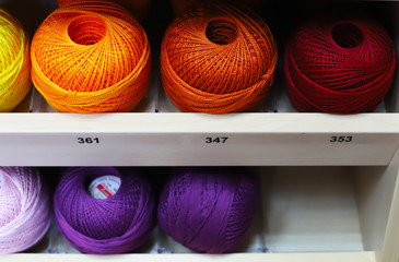 threads of different colors in the store in the coil and in the Babin concept fabric shop,thread factory and handmade