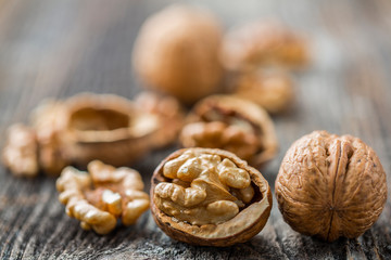 Handful of Walnuts on wooden background
