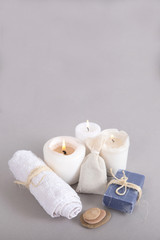Spa objects with three candles.