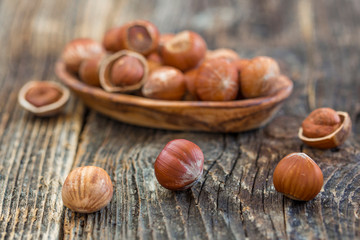 Close up of hazelnuts on wooden table