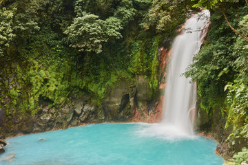 Fototapeta na wymiar Waterfall of the Celeste River in Tenorio Volcano National Park, Costa Rica
