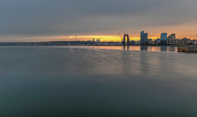 Obraz premium Panorama of the seaside boulevard in Baku at sunset day