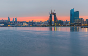 Fototapeta premium Panorama of the seaside boulevard in Baku at sunset day