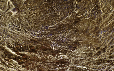 background with metallic luster. imitation gold surface. raw nugget