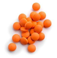 Heap of pills on white background