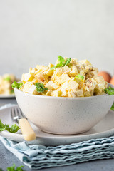 Healthy chicken salad with egg, apple and daikon. Keto diet. 