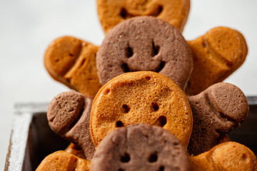 Collection of various gingerbread men in rows