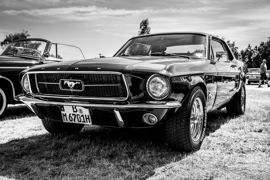 PAAREN IM GLIEN, GERMANY - MAY 19, 2018: Iconic American car Ford Mustang (first generation). Black and white.