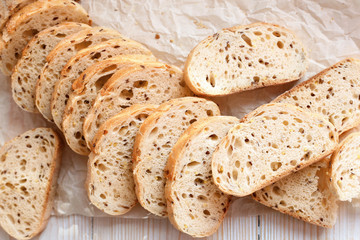 Sliced homemade bread with sesame and flax seeds