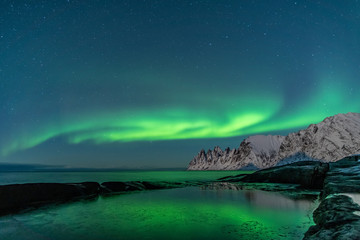 Northern lights, Aurora Borealis, Devil Teeth mountains in the background, Tungeneset, Senja, Norway