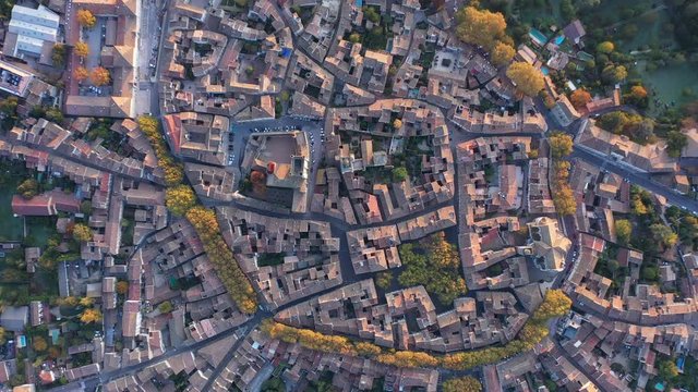 Vertical aerial view over Uz&egrave;s south of France Gard beautiful village sunrise historical city center 
