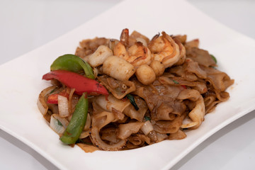 Spicy Seafood Drunken noodle (Pad Kee Mao) Thai Food.