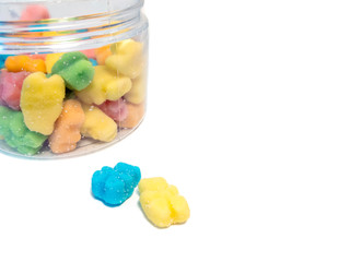CBD infused medicinal sour candy gummies used for healing on a plain white background