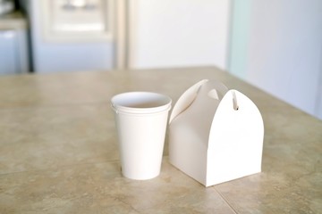 White paper cups and box.