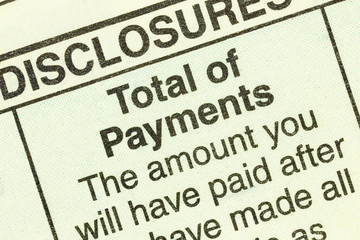 Close up macro view of total number of loan payments detail in the standard federal truth in lending section on an automobile purchase loan form.