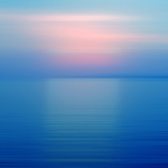 Abstract blue background motion blur sunset on the sea