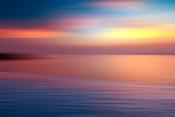 Naklejka na ściany i meble Motion blurred background of refraction in the sea