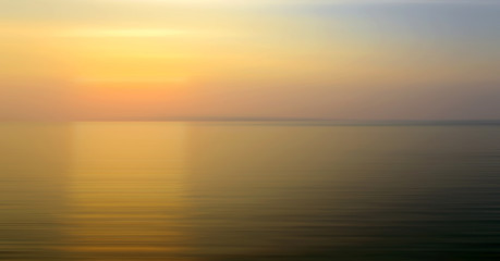 Abstract background motion blur sunset on the sea