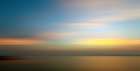 Motion blurred background of refraction in the sea