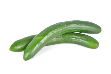 uncooked whole fresh Japanese cucumbers on white background