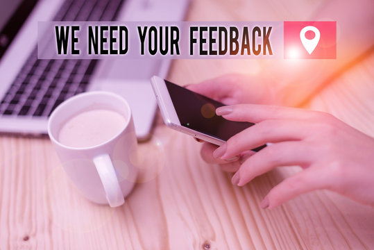 Word writing text We Need Your Feedback. Business photo showcasing criticism given to say can be done improvement woman laptop computer smartphone mug office supplies technological devices