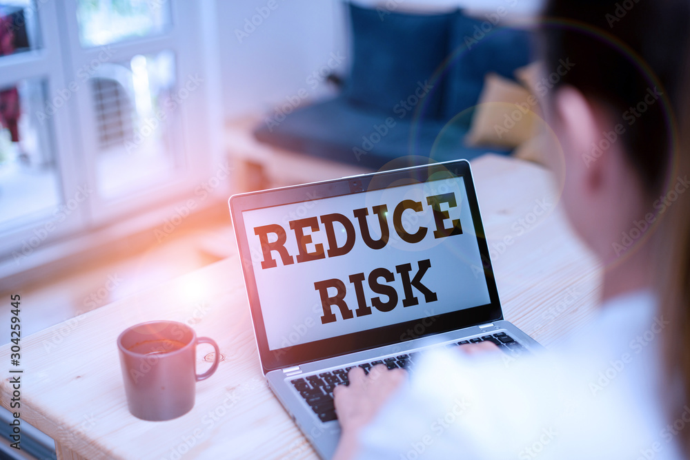 Poster writing note showing reduce risk. business concept for lessen the potential damage that could be cau
