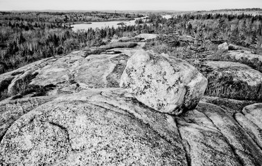 Boulders on stone in a barren wilderness.