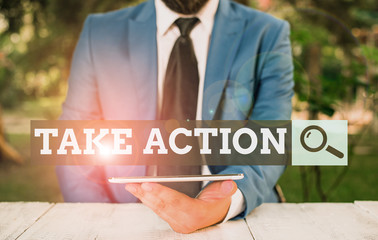 Word writing text Take Action. Business photo showcasing to do something To act in order to get a...