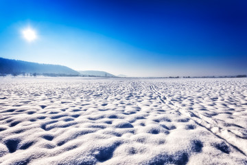 winter landscape with mountains and blue sky