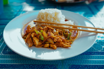 Asian kitcken, Indian Nut with Chicken and Rice on the table