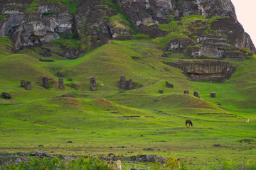 Rano Raraku volcano, the quarry of the moai with many uncompleted statues. Rapa Nui National Park,...