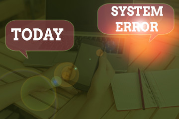 Writing note showing System Error. Business concept for instruction that is not recognized by an...