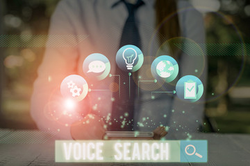 Conceptual hand writing showing Voice Search. Concept meaning allows the user to use a voice...